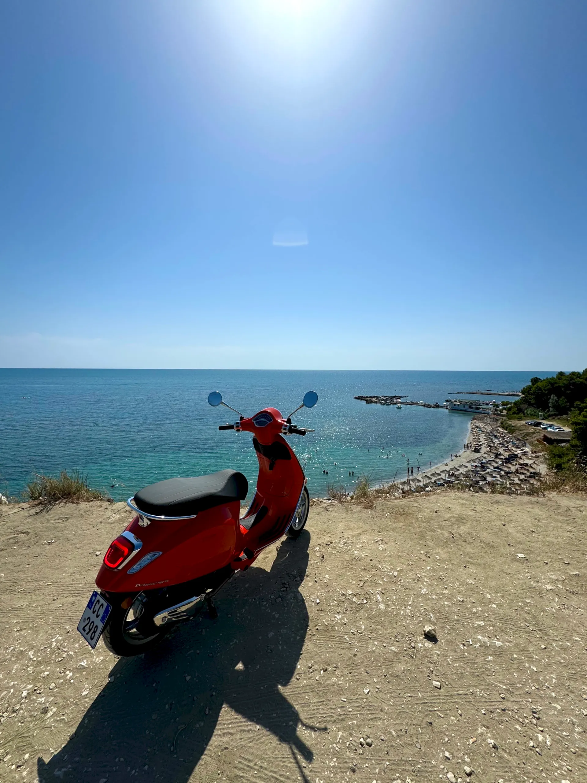 Vespa on the Albanian coast at golden hour