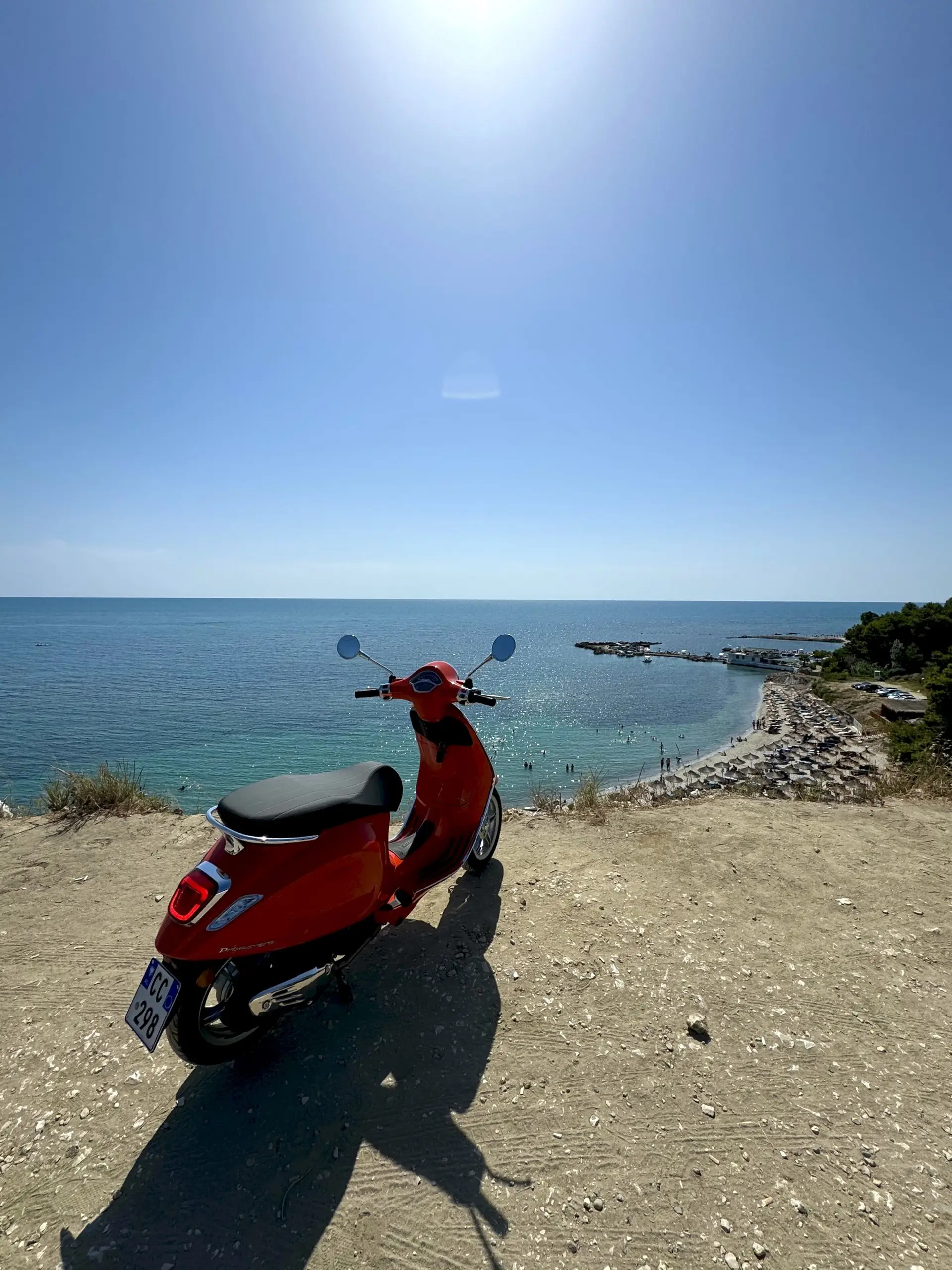 Vespa on the Albanian coast at golden hour